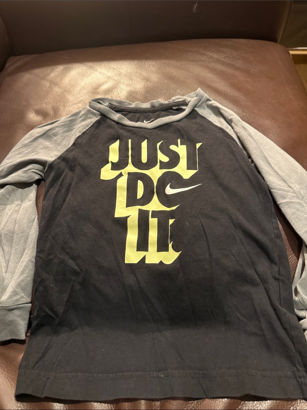 Nike Kids Long-Sleeve Raglan Shirt in Black with Gray Sleeves and Yellow Graphic